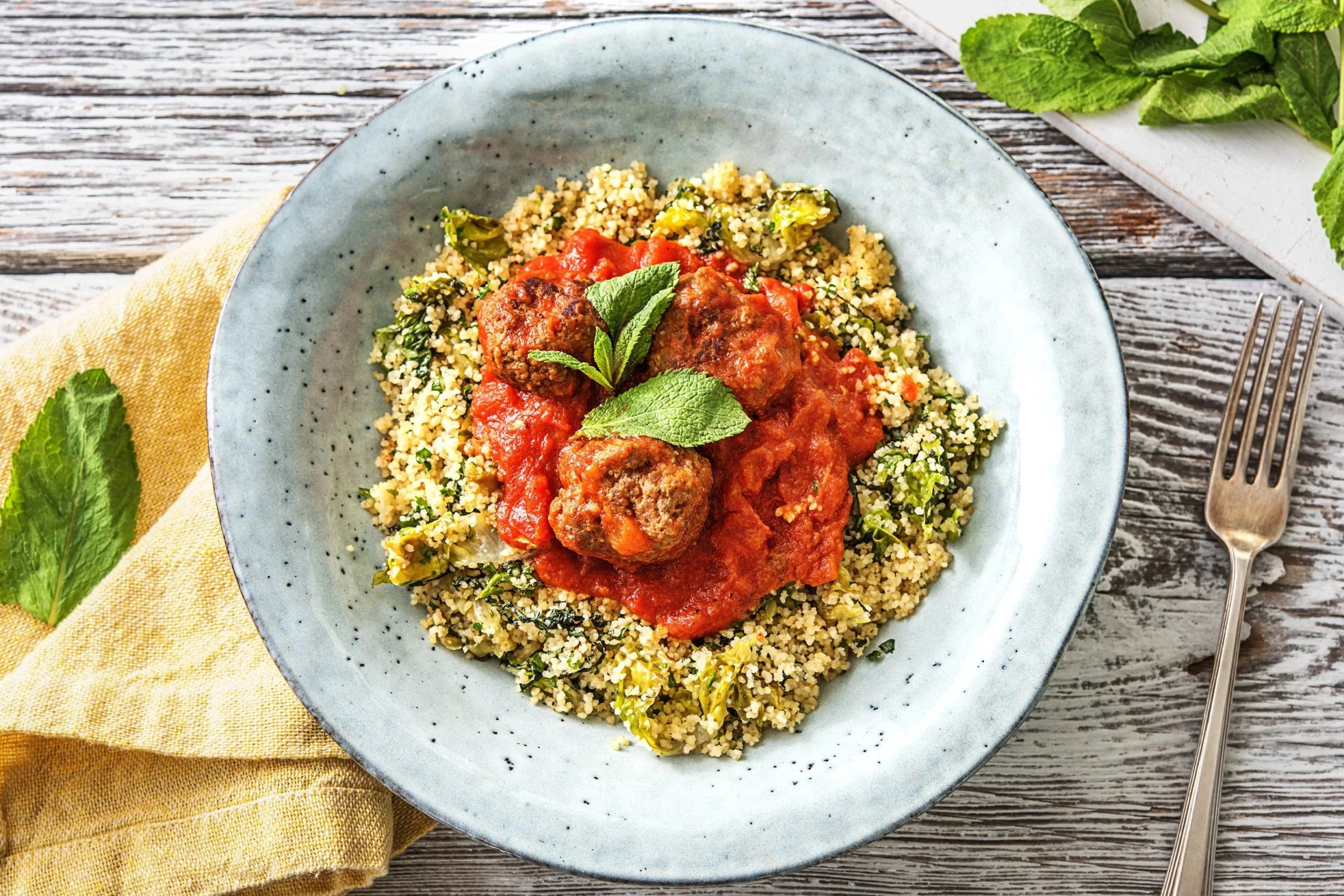 Beef Meatballs and Spicy Tomato Sauce with Herb Semolina